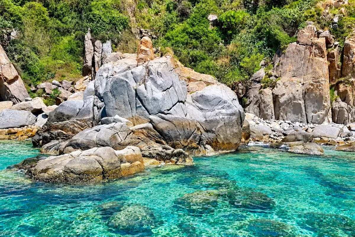 Vinh Hy Bay with rocky coastline in south-central Vietnam